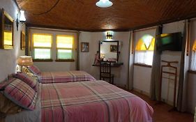 Suites Poza Real